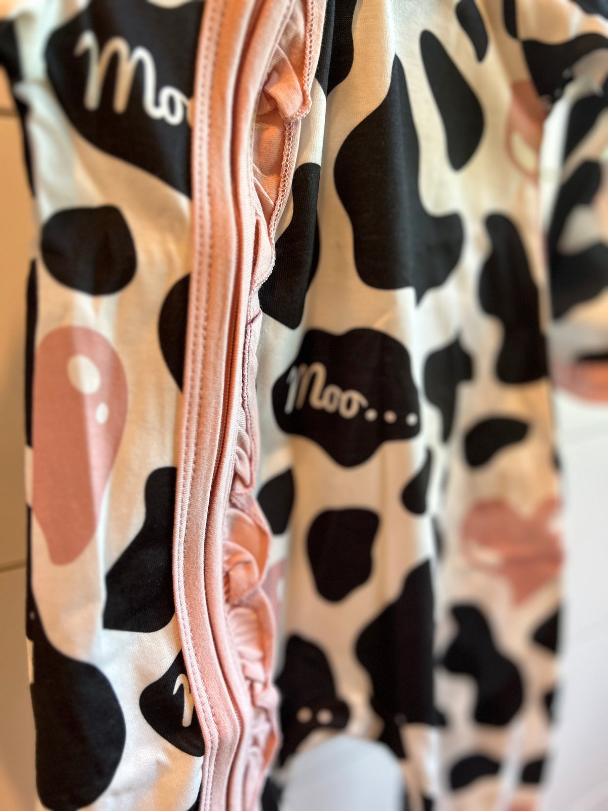 Pretty In Moo Ruffle Zip Sleeper