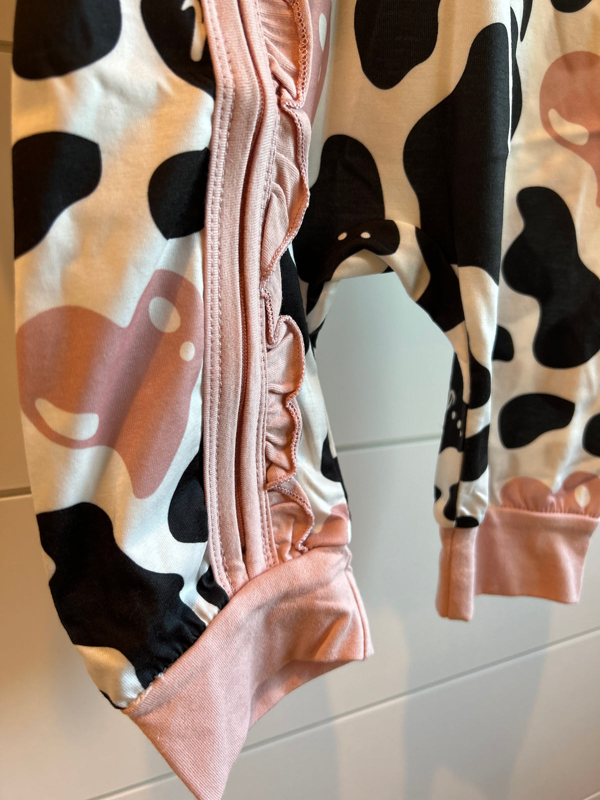 Pretty In Moo Ruffle Zip Sleeper