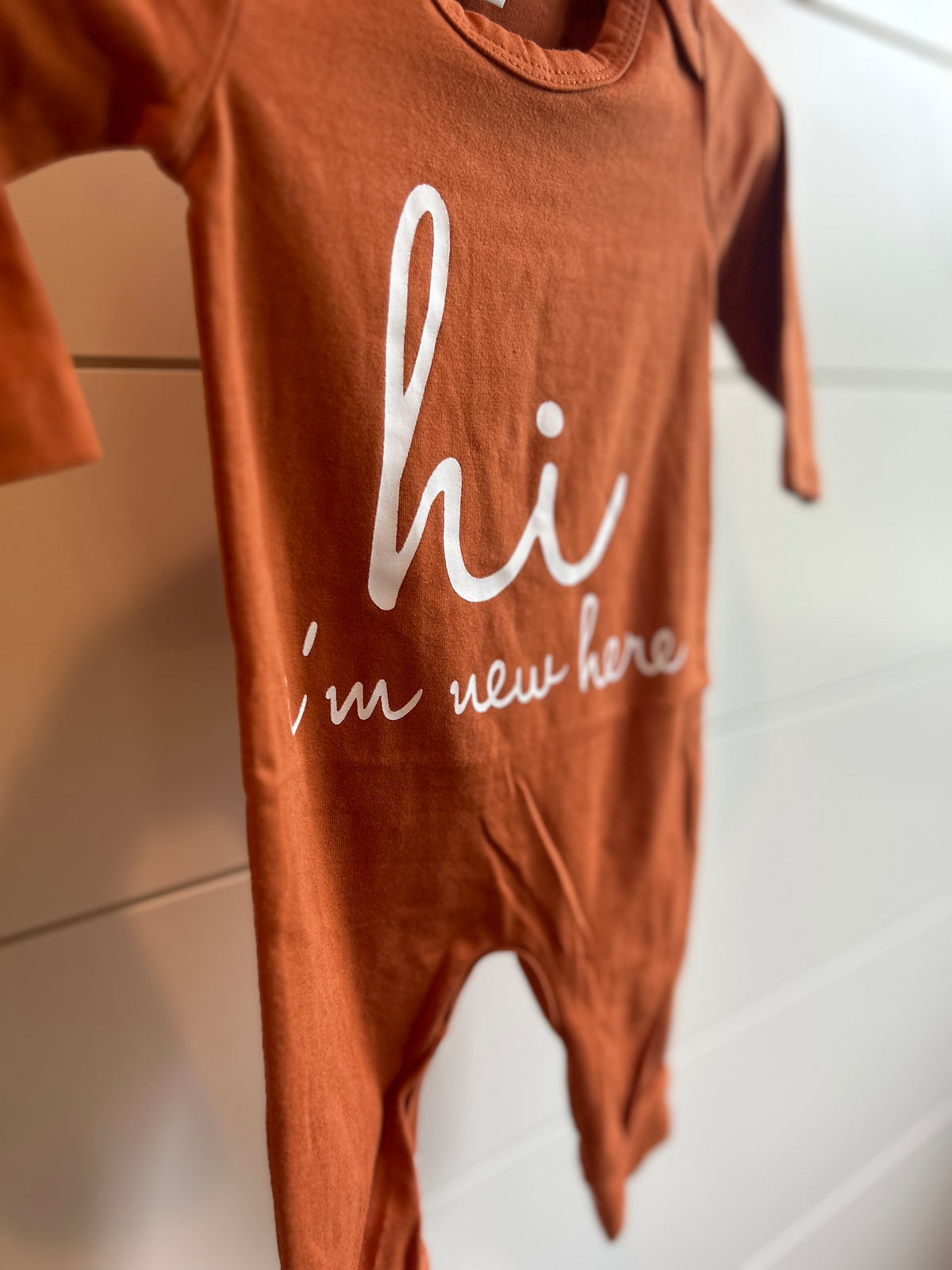 Hi, I’m New Here Long Sleeve Onesie - Multiple Colors